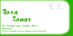 nora komar business card